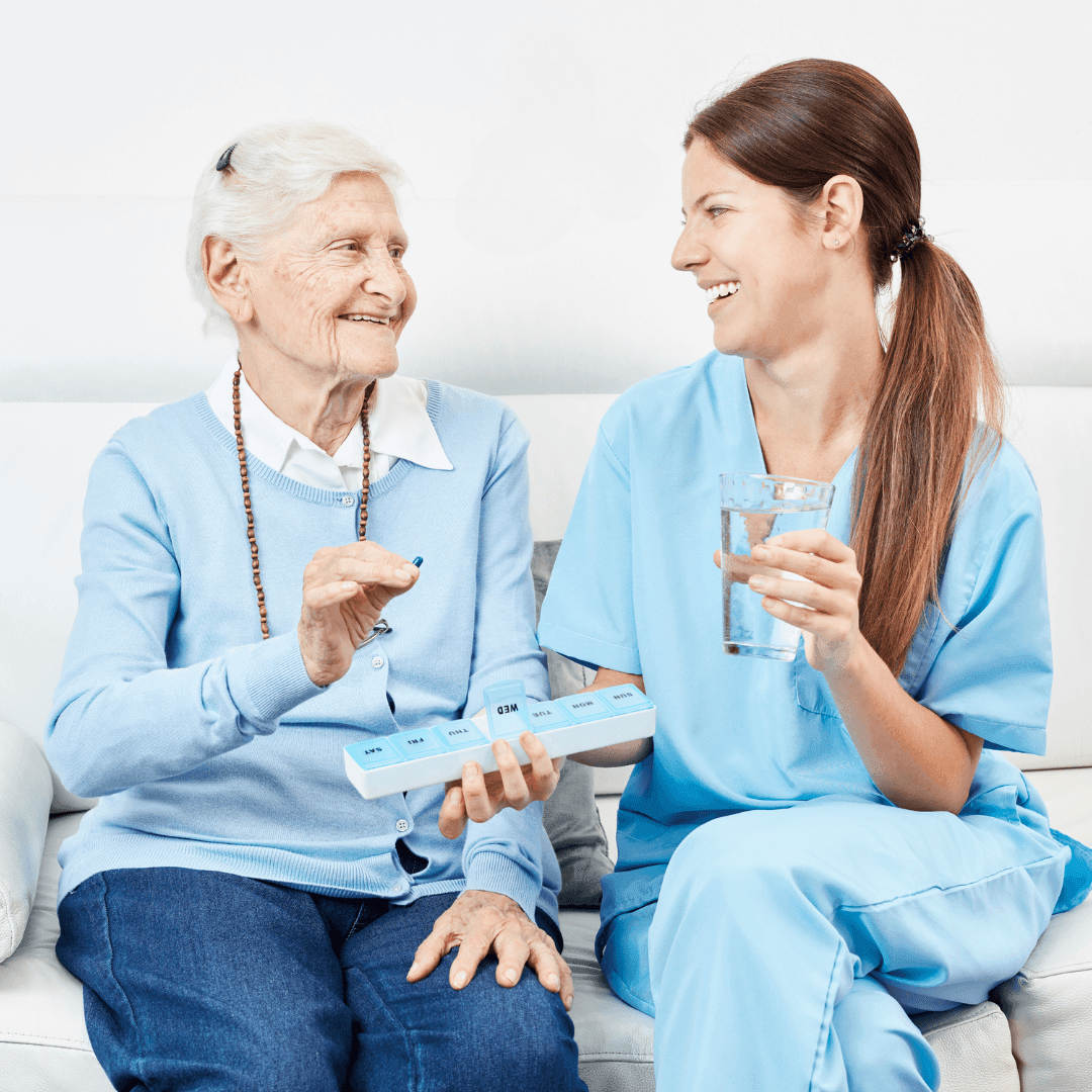 Registered Nurse helping patient with medication management, administering pills